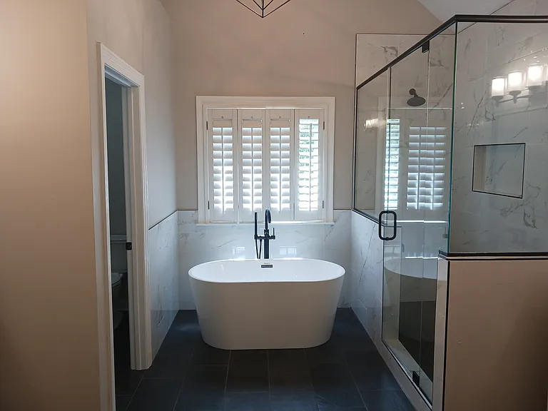 Master ensuite includes soaking tub, oversized walk-in shower and two separate vanities.