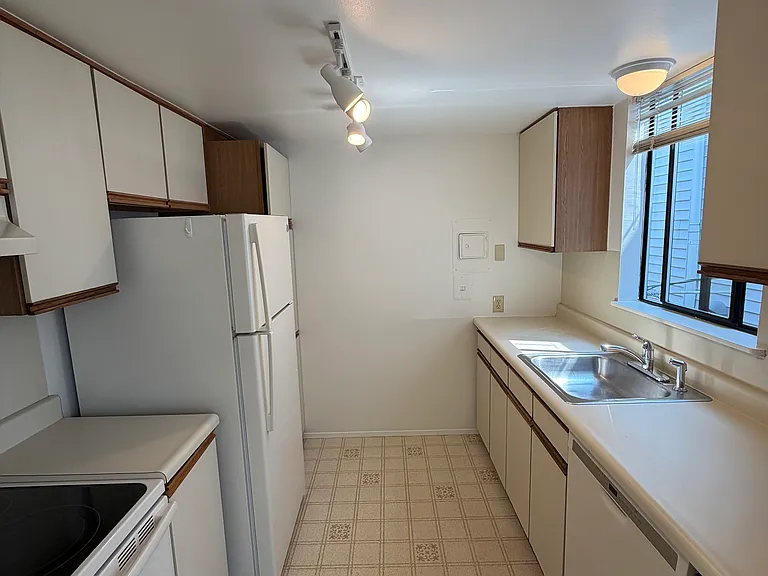 Kitchen with dishwasher and disposal