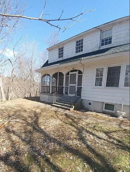 Screened porch overlooking the Claverack Creek.