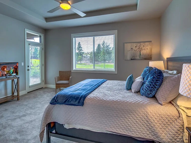 Enjoy the river view from your bed.