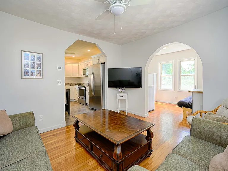 Living Room connecting to Kitchen and Sunroom