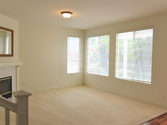 Spacious and comfortable family room off kitchen and opens to backyard