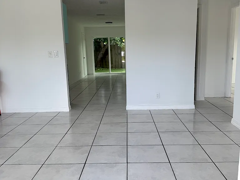 Living room with view to patio