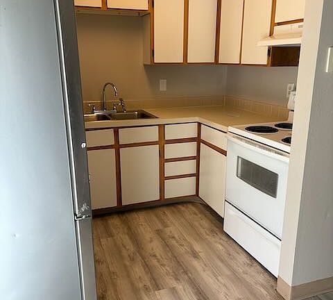 Cabinets to the ceiling for maximum storage.