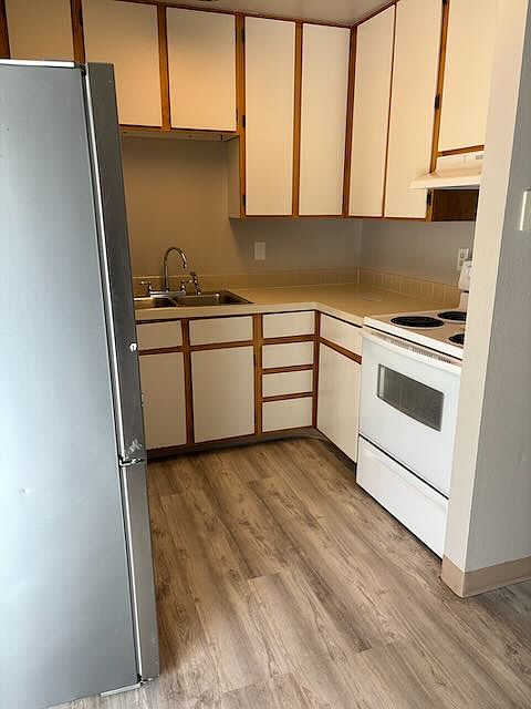 Cabinets to the ceiling for maximum storage.