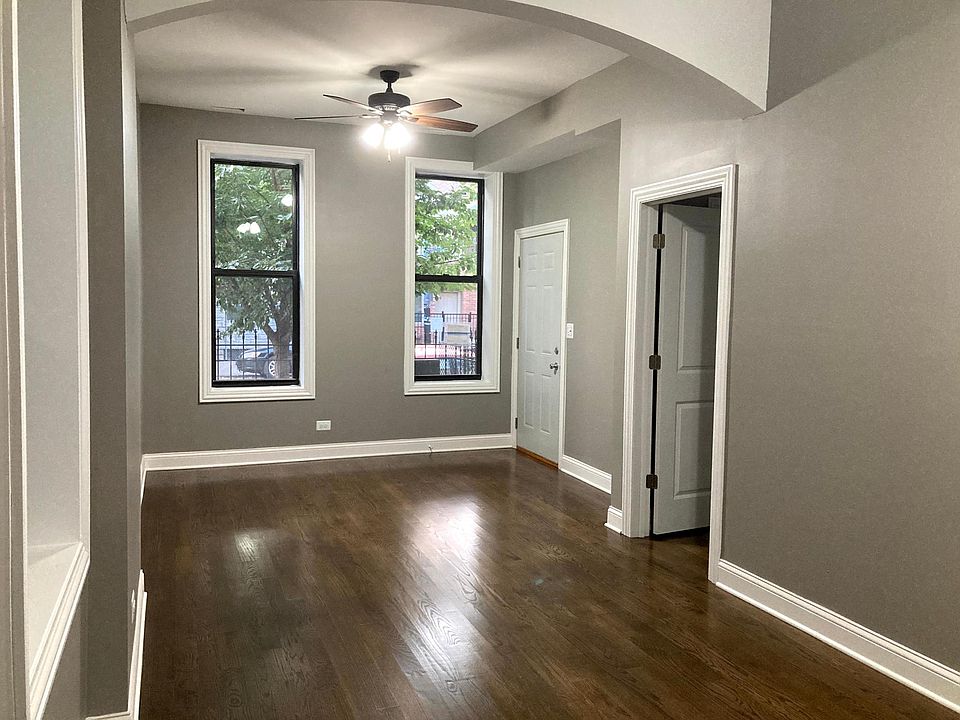 West-facing windows in living room receive afternoon sun