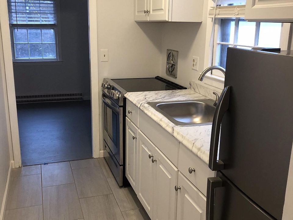 New kitchen with stainless steel appliances