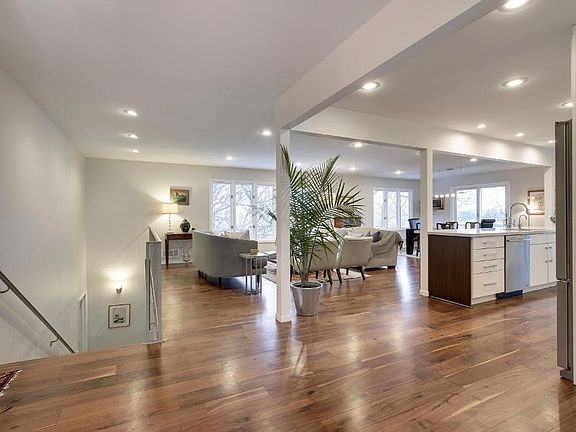 WIDE OPEN FLOOR MAIN FLOOR LIVING AREA WITH WALNUT FLOORS.