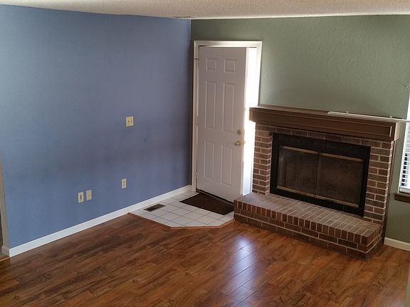 Family room with wood burning fireplace