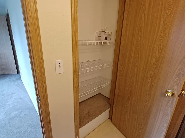 Upstairs bathroom storage area