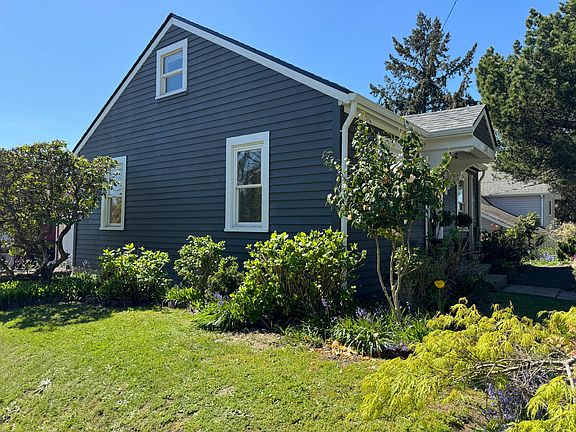 East side of house and yard.