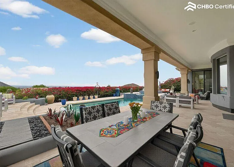 Covered lanai with dining and firepit