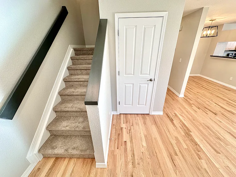 Front entry with foyer coat closet.