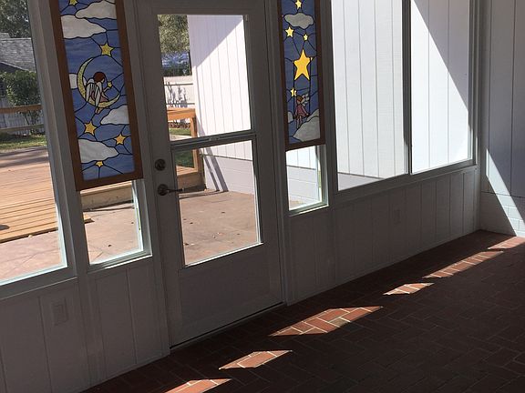 Porch w/ stain glass angels