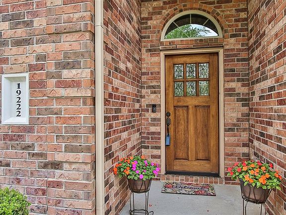 Front porch is covered and all brick. Upgraded Craftsman front door adds to the appeal of this home.