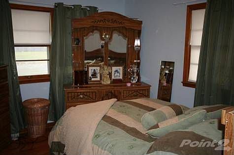 Master Bedroom with Hardwood Floors