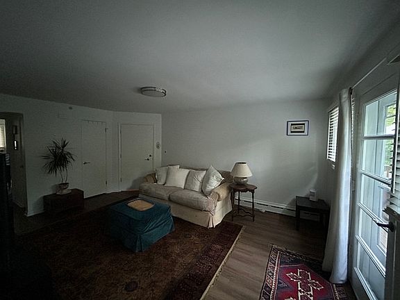 Living Room showing back door to balcony