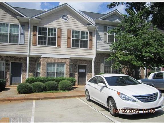 2 PARKING SPOTS IN FRONT OF TOWNHOUSE