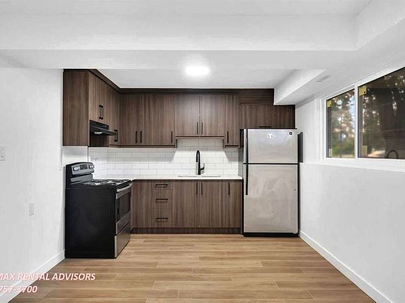 2nd image of 201 Queensland Dr SE #Basement