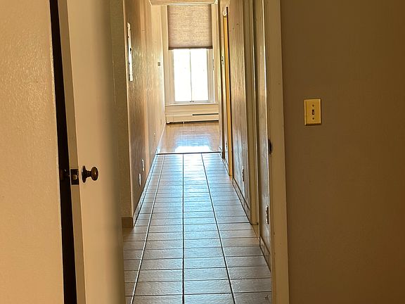 master looking down hall to living room