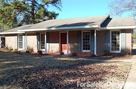 Front of home
						:
						This home has mature plants and trees in the yard and a front porch for relaxing
