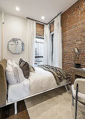 3rd image of 61 E 7th St APT 1A