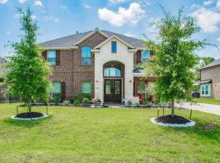11027 N Country Club Green Dr, Tomball, TX 77375