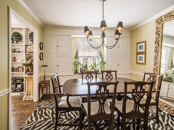 Dining room with wide plank wood floors