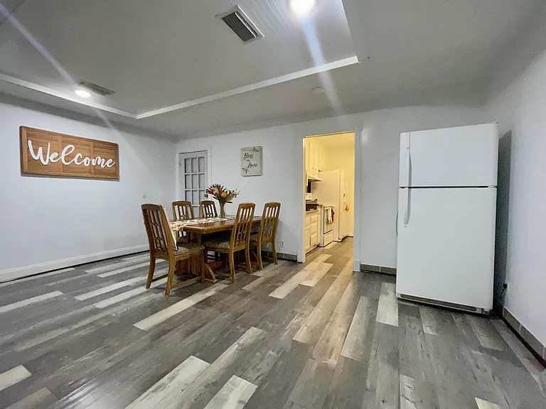 Dining room common area, entrance to kitchen, 2nd refrigerator with ample storage space