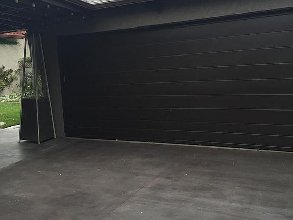 Detached Garage behind gate