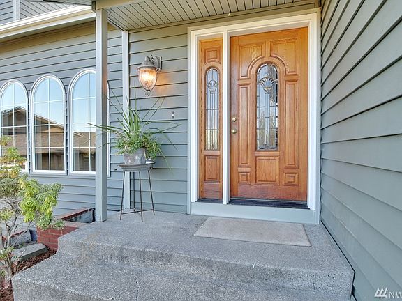 Open and Inviting Covered Front Patio. Welcome Home!