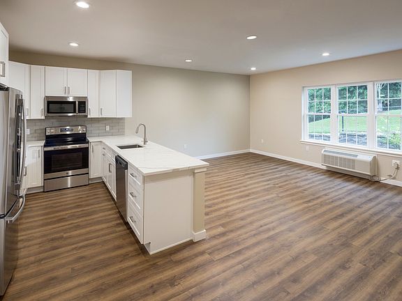 Townhouse White Stone Counters Featured in Apt# 102, #104, & #106