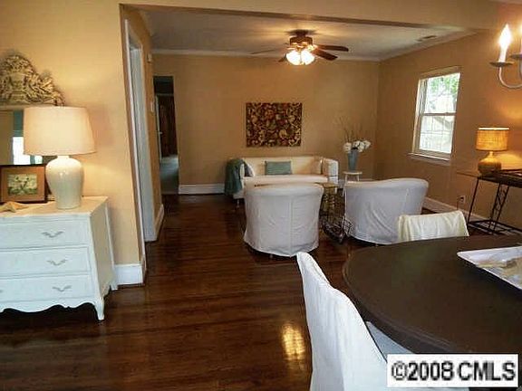 Large great room with newly refinished hardwood floors