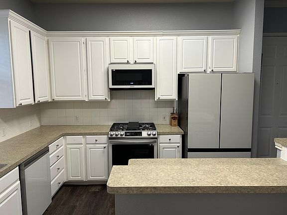 New White Glass Front Range, Dishwasher, Refrigerators & Microwave