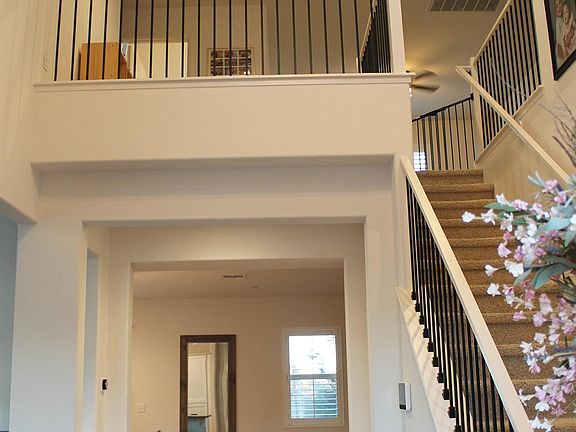 Foyer/stairs/upstairs loft