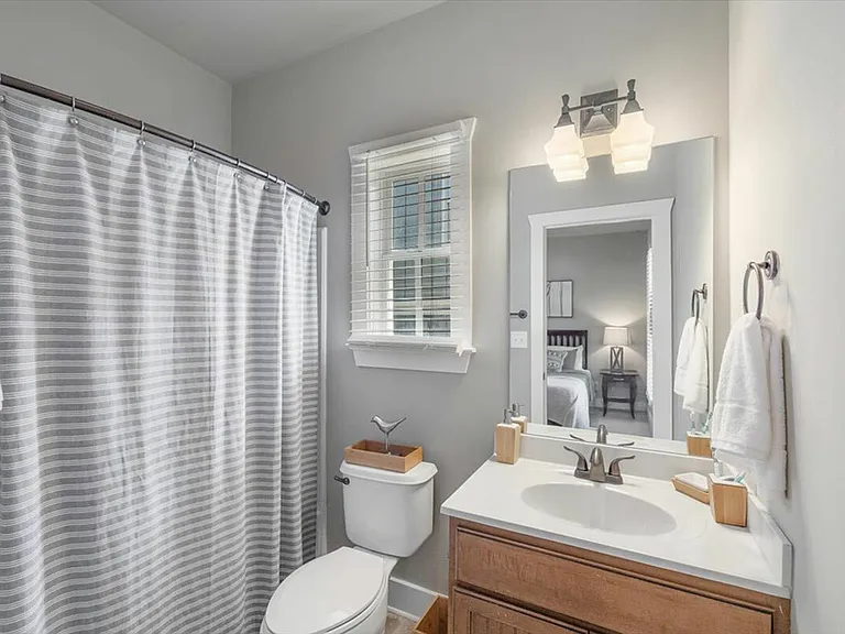 Private bathrooms with modern design at The Cottages of Hattiesburg.