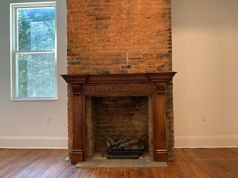 Living Room with decorative fireplace