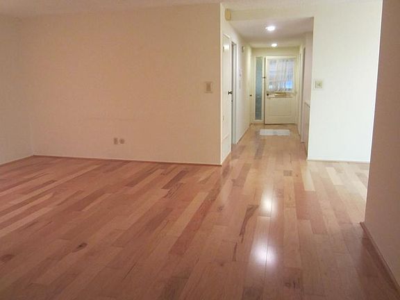 View from Living room ( into hallway that leads to front doo