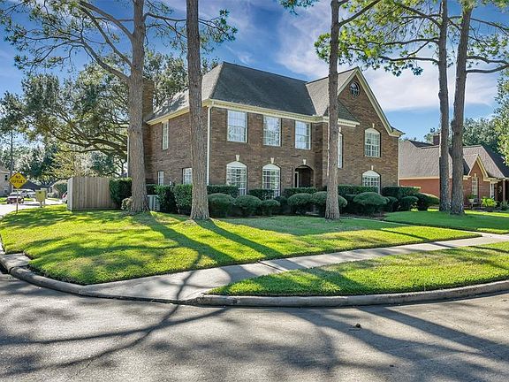 This home is situated on a corner lot of a quiet, tree lined street.