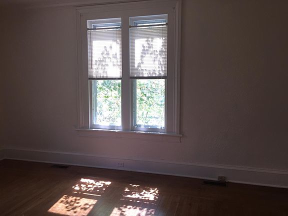 Natural light floods the large living room