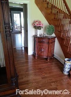 Foyer 1
						:
						Hardwood floors and room for furniture.