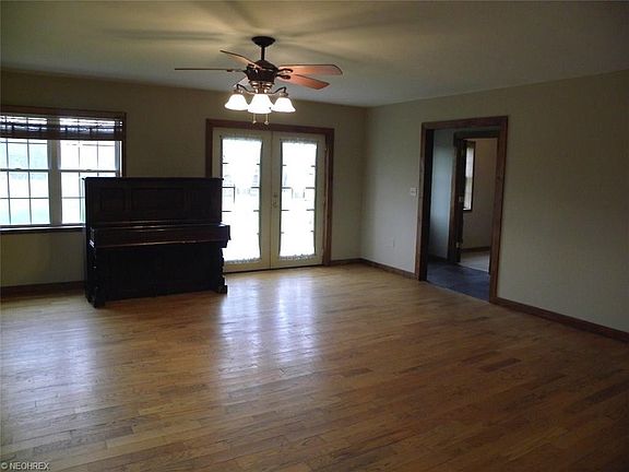 Family room features French doors to back yard and the piano can stay if the buyer so chooses.