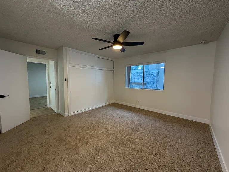 Primary Bedroom with Two Large Closets & Cozy Carpet