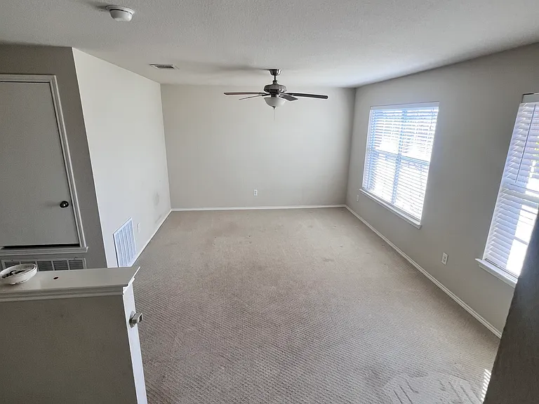 Top of stairs - into living area/play area