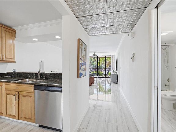 2nd image of 16 Royal Palm Way #205