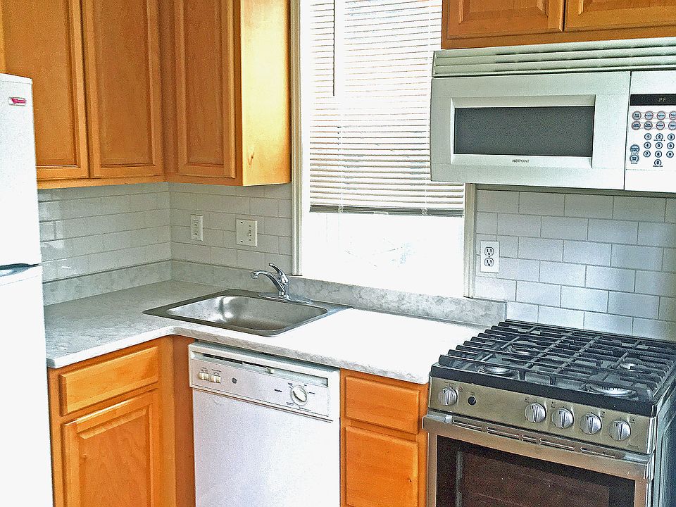 Full kitchen with granite counter top