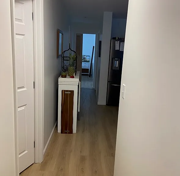 From Msster BR towards BR3, Kitchen on the right, Hallway Bath on the left and BR2 on the Left. (cant see)