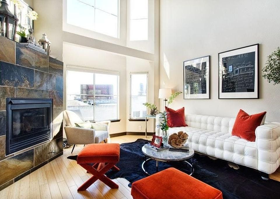 Living room with natural light and gas fireplace