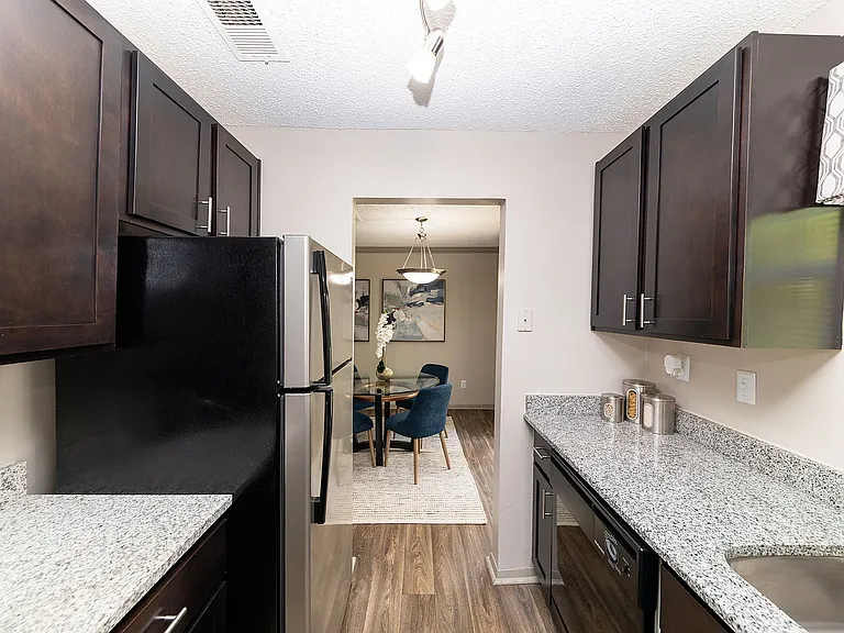 Kitchen with granite counters and stainless appliances