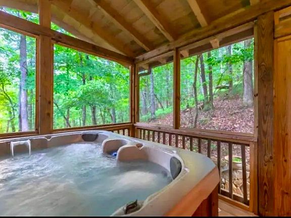 Second private screened in porch with bubbling hot tub off living room